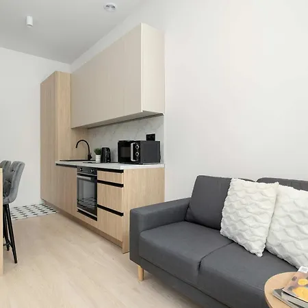 Comfortable With A Desk In The Center Of Near Spodek By Renters