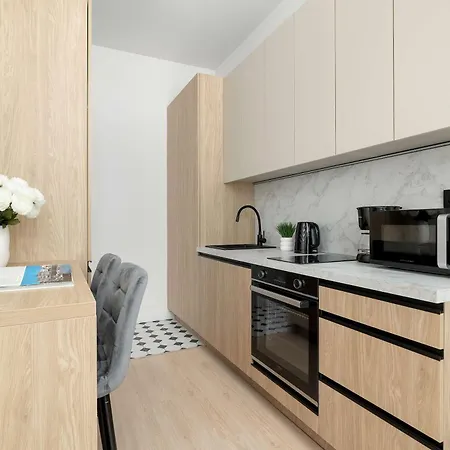 Comfortable With A Desk In The Center Of Near Spodek By Renters